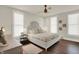 Main bedroom with neutral tones, hardwood floors, and natural light at 847 N Park Ave, Indianapolis, IN 46202