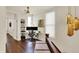 Bright and spacious home office with hardwood floors and a ceiling fan at 847 N Park Ave, Indianapolis, IN 46202