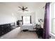 Large primary bedroom with multiple windows, neutral carpet and furniture at 895 Geronimo Dr, Greenfield, IN 46140