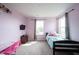 Bedroom featuring two bright windows with curtains, carpet, neutral walls, and a desk at 895 Geronimo Dr, Greenfield, IN 46140