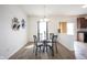 Cozy dining room area with a glass top table and stylish chairs at 895 Geronimo Dr, Greenfield, IN 46140