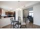 Bright dining area offering a seamless flow into the kitchen and living spaces at 895 Geronimo Dr, Greenfield, IN 46140