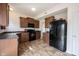 Spacious kitchen has stainless steel appliances, ample cabinet space, and tile floor at 895 Geronimo Dr, Greenfield, IN 46140