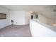 Loft area with neutral carpet at 895 Geronimo Dr, Greenfield, IN 46140
