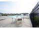 Community pool with lounge chairs, tables, and a clubhouse providing a perfect leisure spot at 895 Geronimo Dr, Greenfield, IN 46140