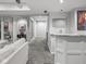 Stylish wet bar with granite countertop and modern fixtures, adjacent to the main living space, ideal for entertaining guests at 914 N College Ave, Indianapolis, IN 46202