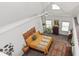 Bedroom with vaulted ceilings, bohemian decor, and ample natural light at 914 N College Ave, Indianapolis, IN 46202