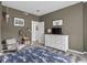 Bedroom features a cozy bed, stylish dresser, and tastefully decorated walls at 914 N College Ave, Indianapolis, IN 46202