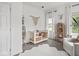 Bright Bedroom features a white crib, plush rug, and stylish decorations at 914 N College Ave, Indianapolis, IN 46202