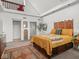 Bright bedroom offers closet space, natural light, stylish furnishings, and decorative accents at 914 N College Ave, Indianapolis, IN 46202