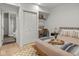 Stylishly furnished bedroom with hardwood floors, closet and adjacent bathroom with a standing shower at 914 N College Ave, Indianapolis, IN 46202