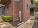 Brick exterior with manicured landscaping and a private walkway at 914 N College Ave, Indianapolis, IN 46202
