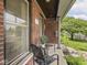 Inviting front porch area with outdoor seating at 914 N College Ave, Indianapolis, IN 46202