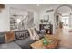Open-concept living room with hardwood floors and neutral decor at 914 N College Ave, Indianapolis, IN 46202