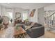 Comfortable living room with large sectional sofa and neutral decor, creating a cozy atmosphere at 914 N College Ave, Indianapolis, IN 46202