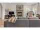 Cozy living room with a decorative fireplace, modern decor, and natural light at 914 N College Ave, Indianapolis, IN 46202