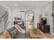 Spacious living room with hardwood floors, neutral tones, and an open floor plan at 914 N College Ave, Indianapolis, IN 46202