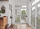 Mud room with natural light, coat rack, and access to the backyard at 914 N College Ave, Indianapolis, IN 46202
