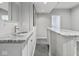 Modern wet bar with a marble countertop and sink, great for entertaining and relaxation in a stylish setting at 914 N College Ave, Indianapolis, IN 46202