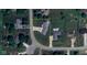 Aerial view of a well-kept property with mature landscaping and a long driveway at 951 N Maiellen Dr, Greenfield, IN 46140