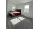 Bright bedroom featuring light gray carpet and clean white walls and windows at 951 N Maiellen Dr, Greenfield, IN 46140