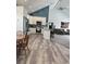 Well-lit kitchen featuring modern appliances, white cabinets, and granite countertops at 951 N Maiellen Dr, Greenfield, IN 46140