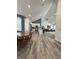 Open floor plan showcasing kitchen, dining, and living areas with modern finishes at 951 N Maiellen Dr, Greenfield, IN 46140
