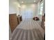 Large and well-lit home office space with neutral colored carpet and bright white trim at 951 N Maiellen Dr, Greenfield, IN 46140