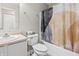 Well-lit bathroom with tub and shower combo, modern vanity, and stylish shower curtain at 9560 W Campfire Dr, Pendleton, IN 46064
