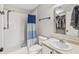Bright bathroom featuring a shower, toilet, and a modern sink with vanity and mirror at 9560 W Campfire Dr, Pendleton, IN 46064