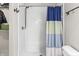 Clean bathroom with shower, toilet, and modern sink with vanity at 9560 W Campfire Dr, Pendleton, IN 46064