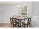 Cozy dining area with natural light and seating for four at 9560 W Campfire Dr, Pendleton, IN 46064