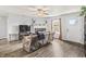 Inviting living room with a cozy fireplace and hardwood floors, perfect for relaxation and entertainment at 9560 W Campfire Dr, Pendleton, IN 46064