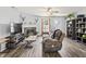 Inviting living room with a cozy fireplace and hardwood floors, perfect for relaxation and entertainment at 9560 W Campfire Dr, Pendleton, IN 46064