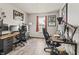 Office space with wood floors, natural light, and two separate work areas at 9560 W Campfire Dr, Pendleton, IN 46064
