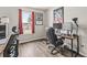 Office space with wood floors, natural light, and a modern desk at 9560 W Campfire Dr, Pendleton, IN 46064