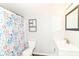 This bathroom offers a colorful shower curtain and vanity with stylish fixtures at 9676 W Constellation Dr, Pendleton, IN 46064