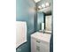 Bathroom featuring a single sink vanity and framed mirror at 9676 W Constellation Dr, Pendleton, IN 46064