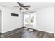 Bright bedroom with hardwood floors and window with view at 9676 W Constellation Dr, Pendleton, IN 46064