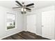 This bedroom features wood-look floors, neutral paint, and a window at 9676 W Constellation Dr, Pendleton, IN 46064