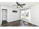 Bright bedroom with neutral paint, hardwood floors, and window at 9676 W Constellation Dr, Pendleton, IN 46064