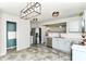 This kitchen features stainless steel appliances and light blue cabinets at 9676 W Constellation Dr, Pendleton, IN 46064