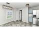 View of kitchen and eating area with natural light and modern fixtures at 9676 W Constellation Dr, Pendleton, IN 46064