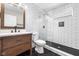 Updated bathroom featuring modern subway tile, sleek fixtures, and a glass-enclosed shower at 1016 Churchman Ave, Indianapolis, IN 46203