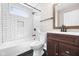 Bathroom featuring black fixtures, subway tile surround and decorative niche at 1016 Churchman Ave, Indianapolis, IN 46203