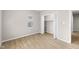 Empty bedroom with neutral walls, wood flooring and a closet at 1016 Churchman Ave, Indianapolis, IN 46203