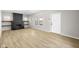 Bright, open living area with a fireplace and light wood flooring, offering a welcoming atmosphere at 1016 Churchman Ave, Indianapolis, IN 46203