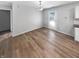 The dining area offers wood-look floors and a patio door leading to the backyard at 10366 Camby Xing, Fishers, IN 46038