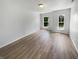Spacious living room with ample natural light from two large windows at 10366 Camby Xing, Fishers, IN 46038