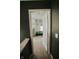 A bedroom featuring an open door with view of play area at 10447 Pintail Ln, Indianapolis, IN 46239